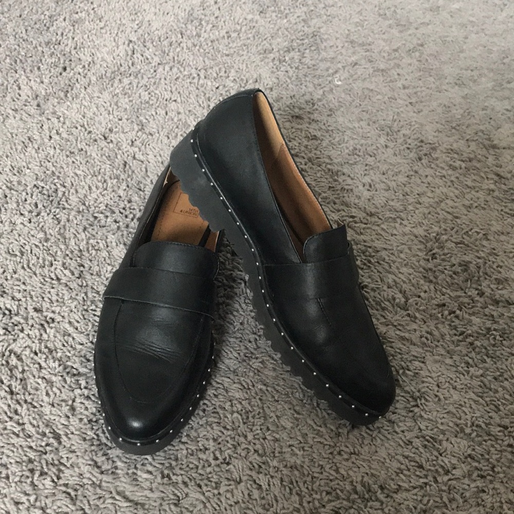 Black studded loafers